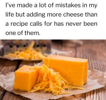 A block of cheddar cheese with shredded cheese on parchment paper, with a humorous quote about adding extra cheese.