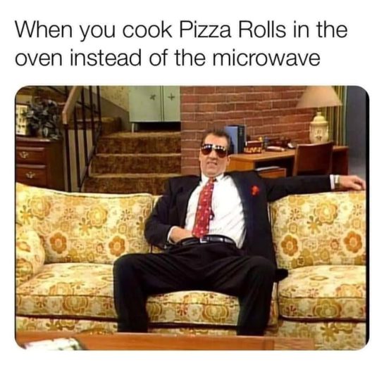 Man relaxing on a couch after cooking pizza rolls in the oven.
