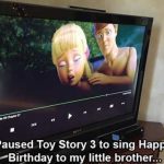 Hilarious paused scene from Toy Story 3 showing an awkward moment on TV.