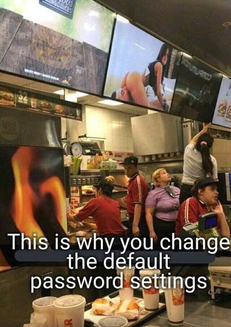 A McDonald's screen hack displaying inappropriate content due to unchanged default passwords.
