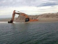 An excavator sinking into water with the caption "Gary knew he messed up."