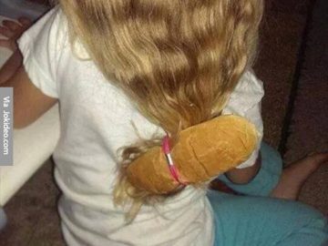 A girl with a literal bread bun tied into her hair as a ‘bun’ hairstyle.