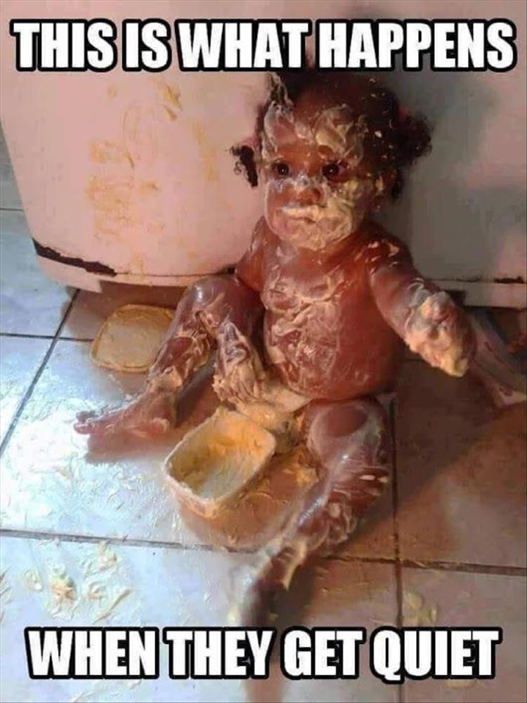 Baby covered in food making a mess on the floor