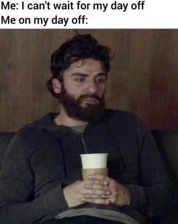 Tired man on sofa holding cup, reflecting day off meme humor.