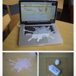Laptop with a fake spill prank setup ready for laughs