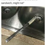 Butter knife resting on sink with leftover spread in funny scenario