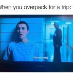 TV screen showing humorous scene about packing too many pants.