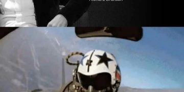 Fighter pilot in cockpit reading "So You Want to Be a Pilot" book.
