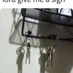 Key shadows create a hanging figure in a dark humor twist.