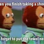 Monkey puppet looks nervous after realizing there's no towel after shower.