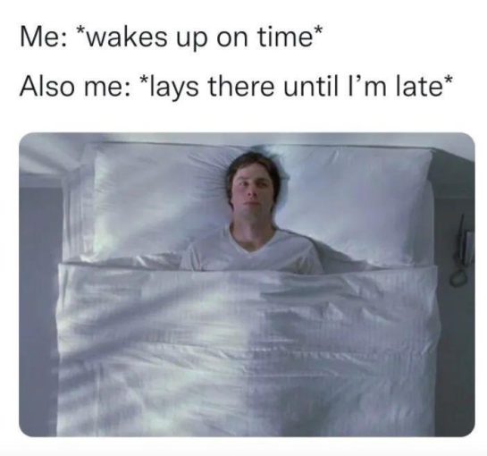 Person awake in bed ready to get up but staying put.