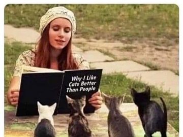 Woman reading to kittens, humorously envisioning her future.