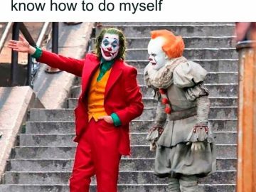 Two clowns on stairs; one teaching the other, cluelessly funny.