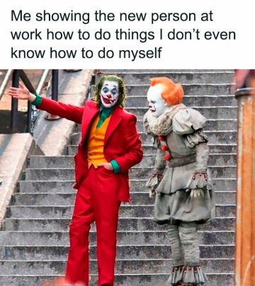 Two clowns on stairs; one teaching the other, cluelessly funny.