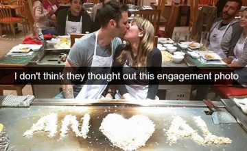 Couple kisses in front of funny engagement rice message mistake.