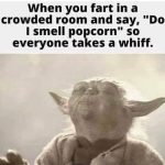 Yoda enjoying the smell after a fart prank in a crowded room.