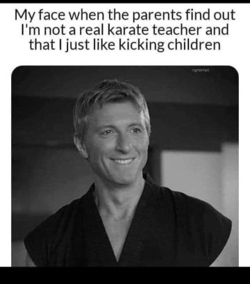 Guy smiling after pretending to be a karate teacher