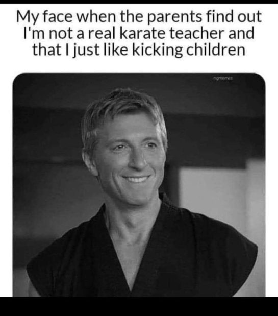 Guy smiling after pretending to be a karate teacher