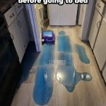Spilled blue detergent on the floor with the caption "I did this 5 minutes before going to bed."