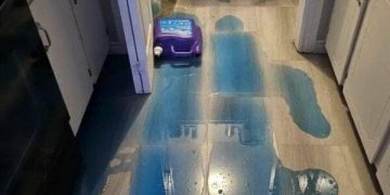 Spilled blue detergent on the floor with the caption "I did this 5 minutes before going to bed."
