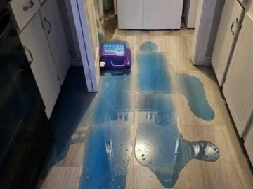 Spilled blue detergent on the floor with the caption "I did this 5 minutes before going to bed."