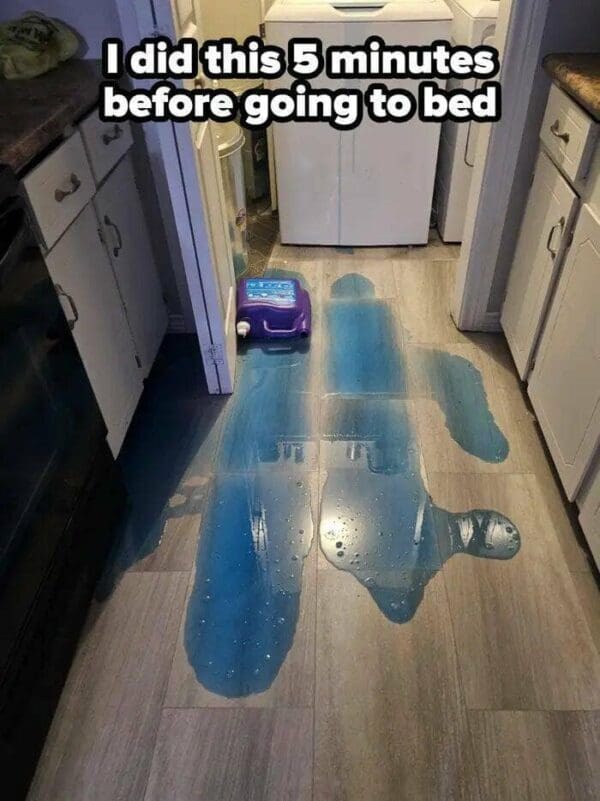 Spilled blue detergent on the floor with the caption "I did this 5 minutes before going to bed."