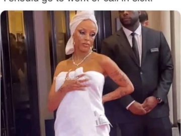 Person wrapped in a towel, contemplating morning work decision