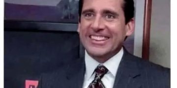 Man smiling proudly after completing one tiny task on a long to-do list.