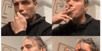 Man celebrating after completing one task on to-do list, feeling accomplished.