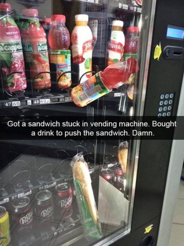 Sandwich and drink stuck in a vending machine in a comical fail.