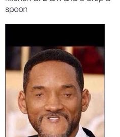 Person looking awkward after dropping a spoon at 2 am in kitchen