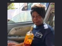 Person with tequila bottle playfully answering how work was.