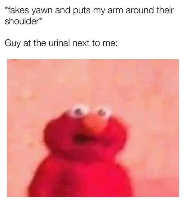 Elmo with surprised face in awkward bathroom situation