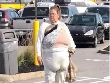 Woman looking disheveled after turning too fast in a parking lot.
