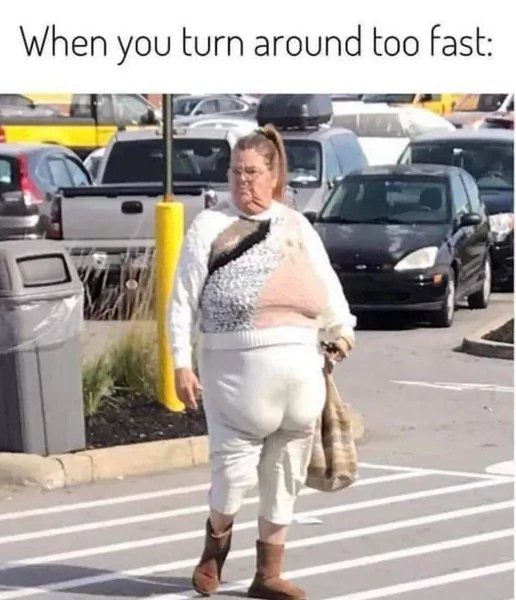 Woman looking disheveled after turning too fast in a parking lot.