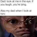Funny dad with exaggerated eyes challenging a staring contest.