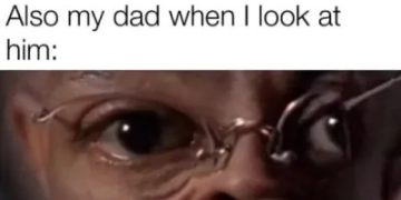 Funny dad with exaggerated eyes challenging a staring contest.