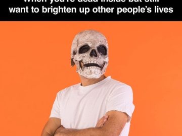 Person wearing a skull mask with a humorous caption about being dead inside.