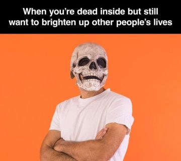 Person wearing a skull mask with a humorous caption about being dead inside.