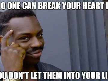 Man pointing to his head with text about avoiding heartbreak.