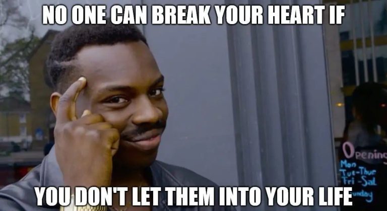 Man pointing to his head with text about avoiding heartbreak.