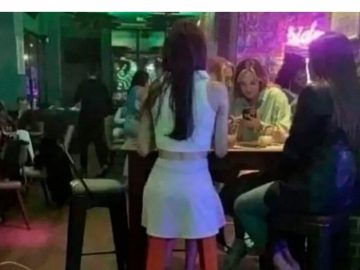 Woman mistaken for pirate on bar stool creates hilarious scene.