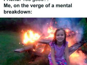 Girl smiling in front of burning table with dark humor caption