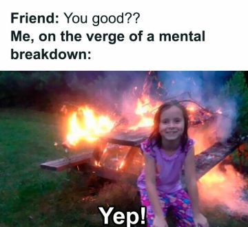 Girl smiling in front of burning table with dark humor caption