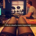 Person playing FIFA while partner looks on, captioned humor.