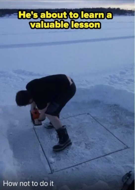 Person cutting a square in ice, about to experience a fail.