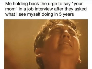 Person struggling to hold back a joke in a job interview.