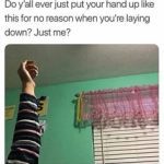 Arm raised in a bedroom, questioning its randomness.