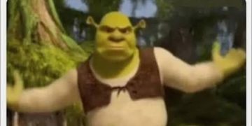 Shrek shrugging with text about being late to work