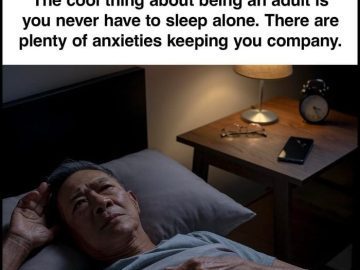 Man lying in bed with open eyes, surrounded by anxieties.